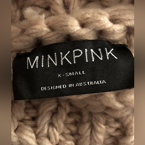 This is a MINKPINK x-small, acrylic sweater. It is lightly worn. - Picture 3 of 3